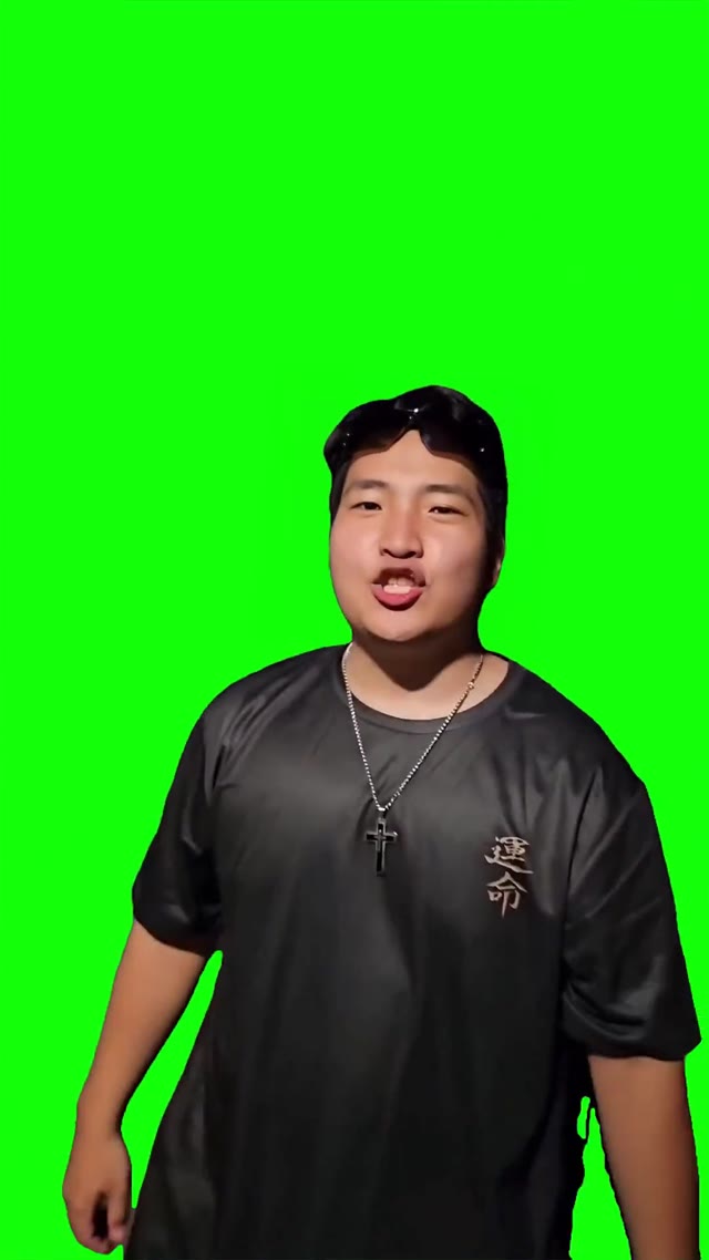 Asian guy singing dia delicia green screen