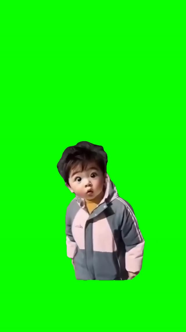 Baby face looking around green screen
