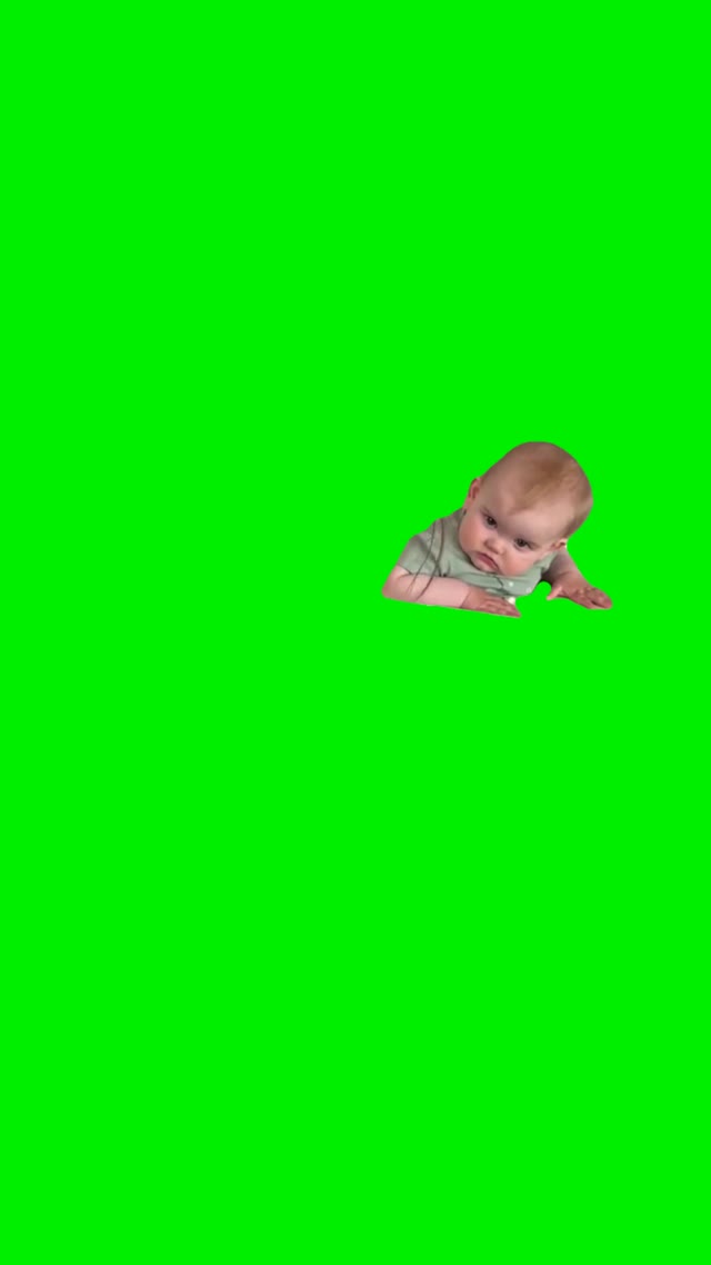 Baby staring green screen
