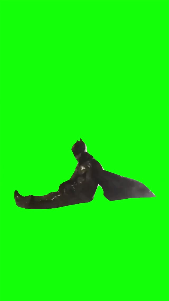Batman sitting in rain green screen