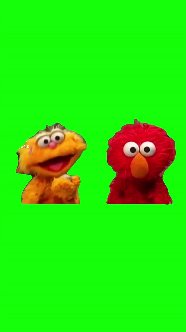 Elmo zoning out green screen