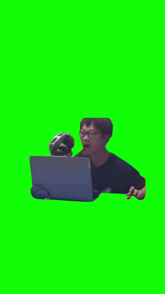 Guy yelling into a mic green screen