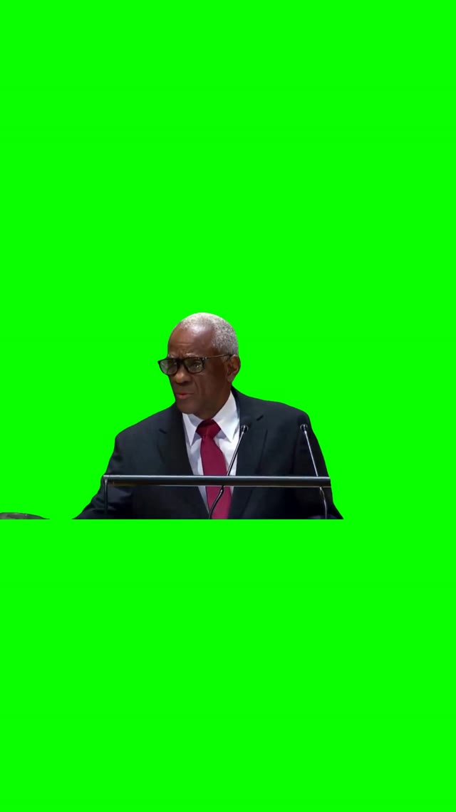 Haitian politician drinks from pitcher green screen