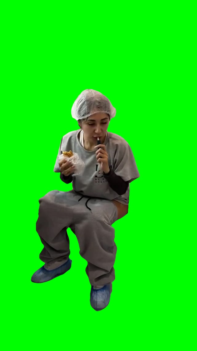 Lady eating on toilet green screen