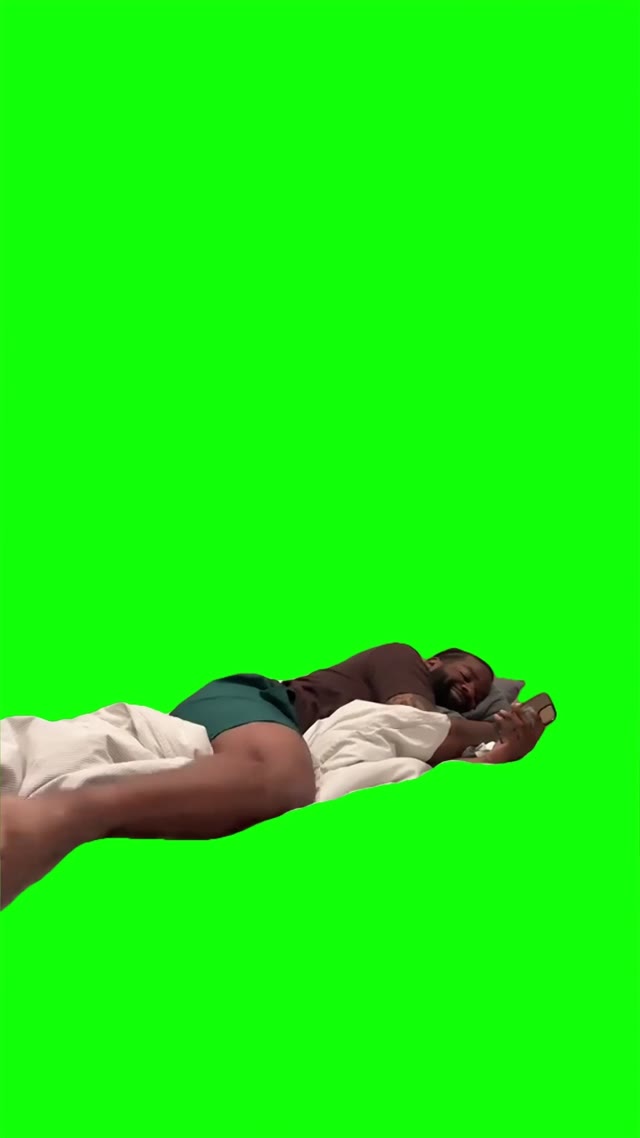 Laying bed watching TikToks green screen