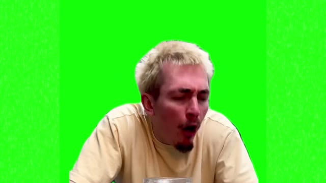 Man gagging green screen