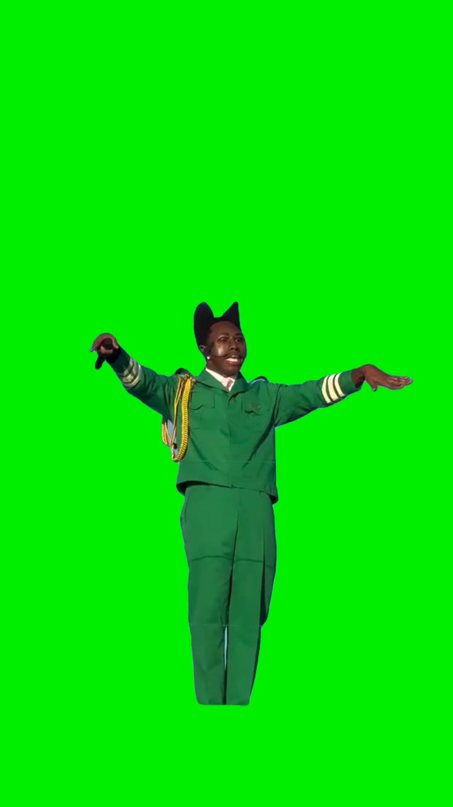 Man in green suit dancing green screen