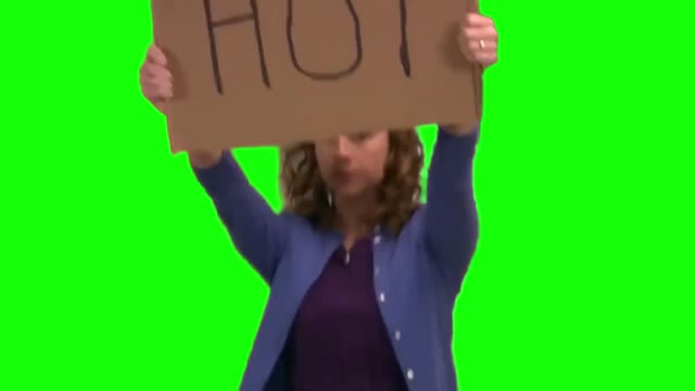 Pam from The Office holding up a HOT sign green screen