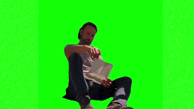 Rick reading a letter green screen