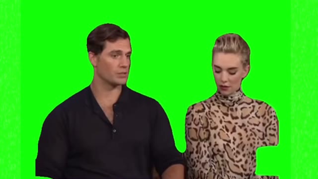 Vanessa starring at Kevin green screen