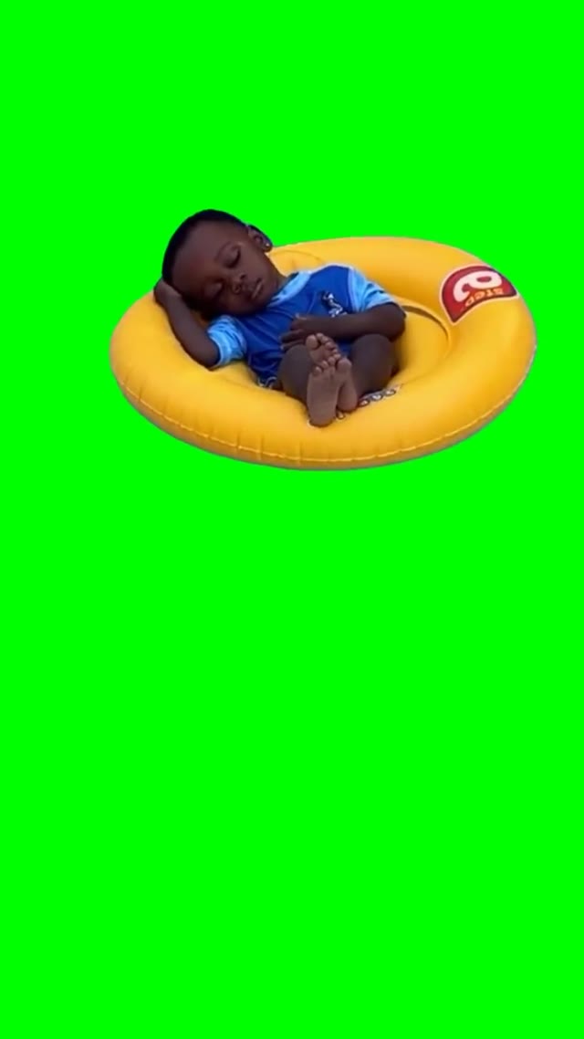 Young fella relaxingchilling on the floaty  green screen