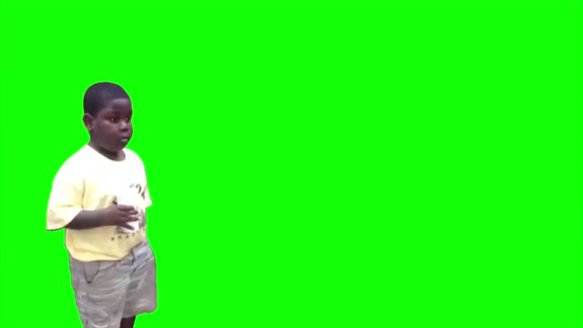 black kid staring green screen
